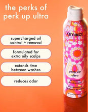 Load image into Gallery viewer, Amika Perk Up Ultra oil control dry shampoo in a pink and orange floral spray can, shown on an orange background with promotional text listing benefits like supercharged oil control and removal.
