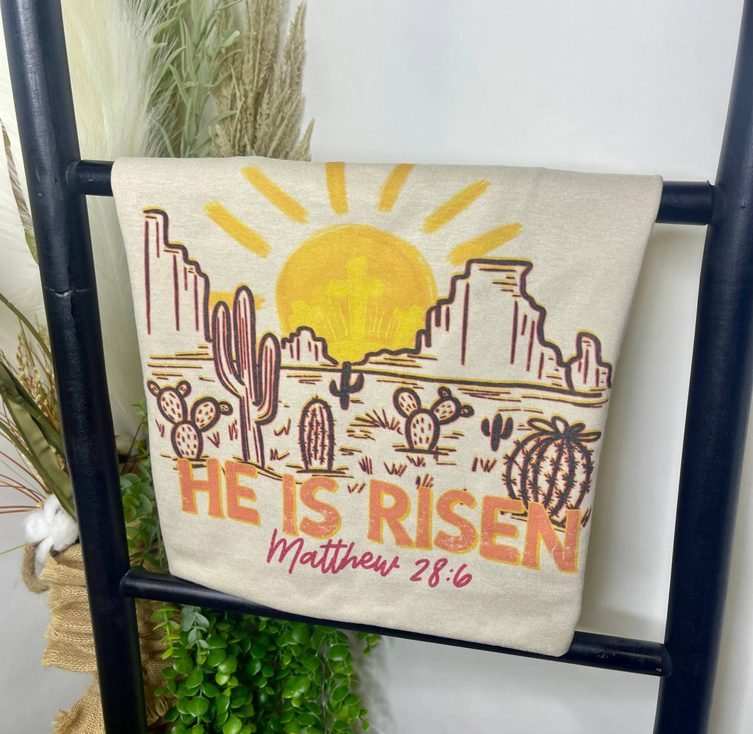 He is Risen in Tan Graphic Tee